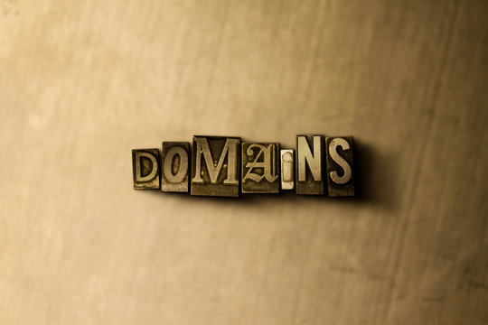 DOMAINS - close-up of grungy vintage typeset word on metal backdrop. Royalty free stock - 3D rendered stock image.  Can be used for online banner ads and direct mail.