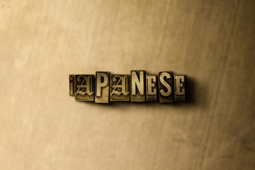 JAPANESE - close-up of grungy vintage typeset word on metal backdrop. Royalty free stock - 3D rendered stock image.  Can be used for online banner ads and direct mail.