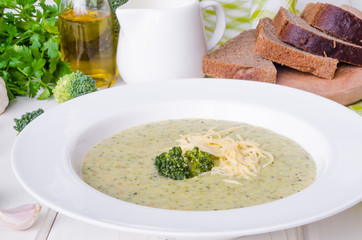 Creamy soup puree with broccoli and green peas