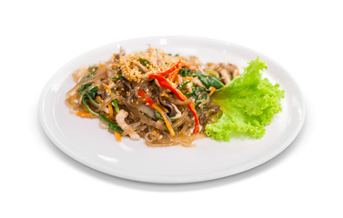 fried vermicelli korean food with mushroom and white sesame on w