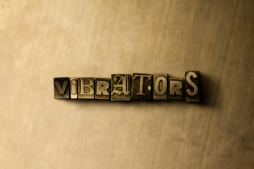 VIBRATORS - close-up of grungy vintage typeset word on metal backdrop. Royalty free stock - 3D rendered stock image.  Can be used for online banner ads and direct mail.