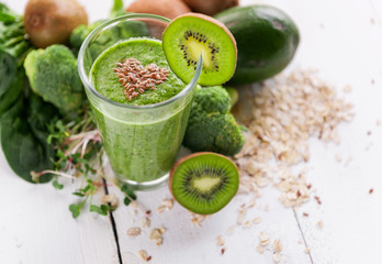 fresh and tasty green smoothie with ingredients
