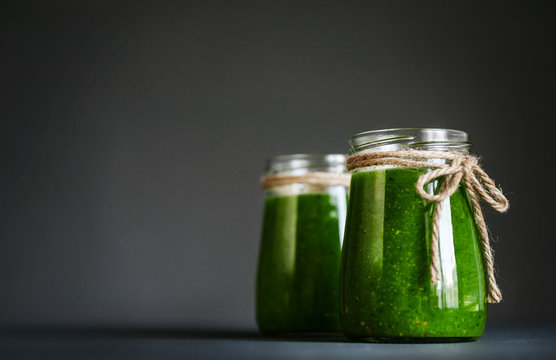 Green smoothies with micro greens, kiwi and orange juice