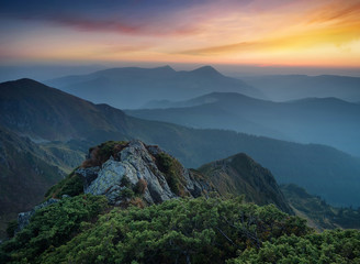 Obraz premium Mountains during sunset. Beautiful natural landscape in the summer time..