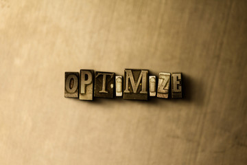Obraz premium OPTIMIZE - close-up of grungy vintage typeset word on metal backdrop. Royalty free stock - 3D rendered stock image. Can be used for online banner ads and direct mail.