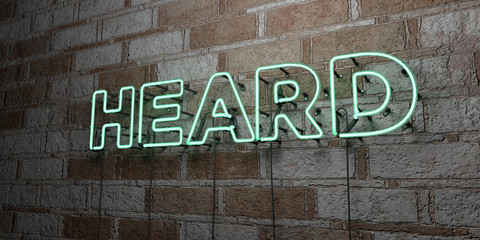 Obraz premium HEARD - Glowing Neon Sign on stonework wall - 3D rendered royalty free stock illustration. Can be used for online banner ads and direct mailers..