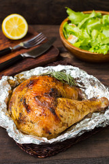 Grilled chicken ham marinated in balsamic sauce, spicy Italian herbs and fresh lemon. Restaurant supply on a wooden table. Close-up