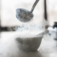 Laboratory experiment with liquid nitrogen in laboratory mortar