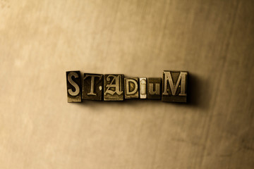 STADIUM - close-up of grungy vintage typeset word on metal backdrop. Royalty free stock - 3D rendered stock image.  Can be used for online banner ads and direct mail.