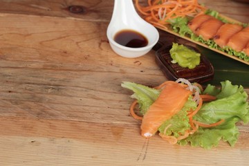 Salmon raw sashimi with wasabi , Japanese food style.