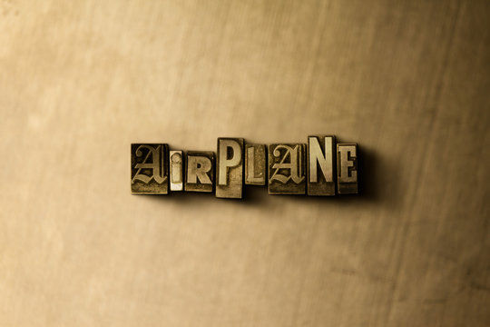 AIRPLANE - close-up of grungy vintage typeset word on metal backdrop. Royalty free stock - 3D rendered stock image.  Can be used for online banner ads and direct mail.