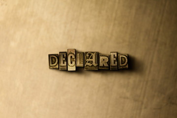DECLARED - close-up of grungy vintage typeset word on metal backdrop. Royalty free stock - 3D rendered stock image.  Can be used for online banner ads and direct mail.