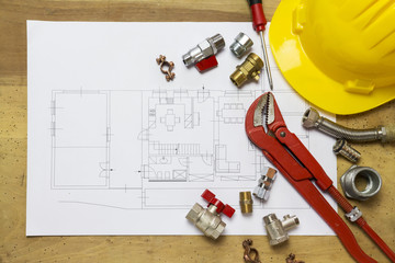 Office desk with hydraulic fittings, helmet  and project design