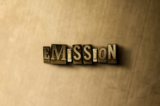 EMISSION - close-up of grungy vintage typeset word on metal backdrop. Royalty free stock - 3D rendered stock image.  Can be used for online banner ads and direct mail.