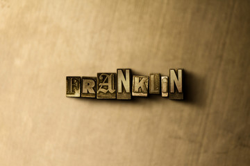 FRANKLIN - close-up of grungy vintage typeset word on metal backdrop. Royalty free stock - 3D rendered stock image.  Can be used for online banner ads and direct mail.