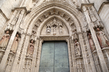 Fototapeta premium San Miguel Entrance, Santa Maria Cathedral Church; Seville
