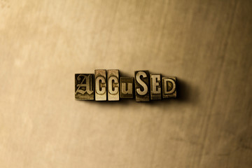 ACCUSED - close-up of grungy vintage typeset word on metal backdrop. Royalty free stock - 3D rendered stock image.  Can be used for online banner ads and direct mail.