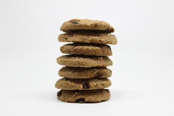 chocolate chip cookie with drops on a white background