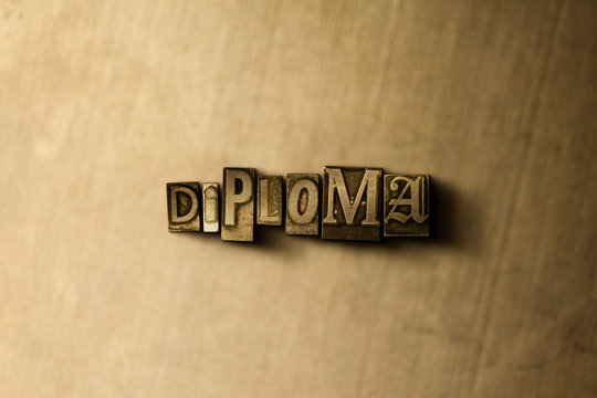 DIPLOMA - close-up of grungy vintage typeset word on metal backdrop. Royalty free stock - 3D rendered stock image.  Can be used for online banner ads and direct mail.