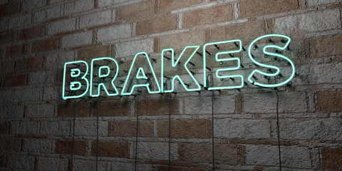 BRAKES - Glowing Neon Sign on stonework wall - 3D rendered royalty free stock illustration.  Can be used for online banner ads and direct mailers..