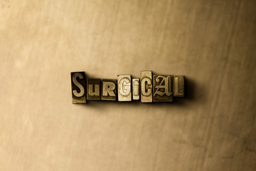 SURGICAL - close-up of grungy vintage typeset word on metal backdrop. Royalty free stock - 3D rendered stock image.  Can be used for online banner ads and direct mail.