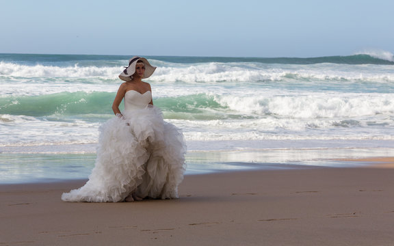PRAIA DA ADRAGA, COLARES, PORTUGAL - OCTOBER 18, 2014: Wedding photo shoot at Adraga beach (Praia da Adraga) in Portugal