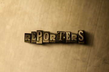 REPORTERS - close-up of grungy vintage typeset word on metal backdrop. Royalty free stock - 3D rendered stock image.  Can be used for online banner ads and direct mail.