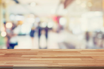 Empty wood table and Blurred background display montage for adve