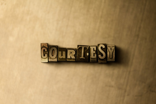 COURTESY - close-up of grungy vintage typeset word on metal backdrop. Royalty free stock - 3D rendered stock image.  Can be used for online banner ads and direct mail.