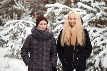girl in a snowy winter forest. slum