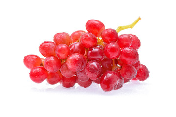 red grapes with water drops isolated on white background.