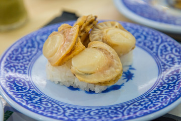 Grilled fresh scallop sushi