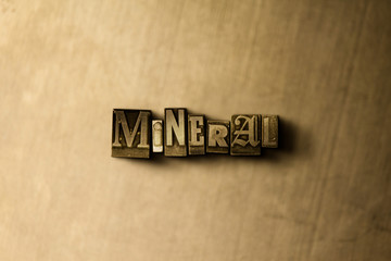 MINERAL - close-up of grungy vintage typeset word on metal backdrop. Royalty free stock - 3D rendered stock image.  Can be used for online banner ads and direct mail.