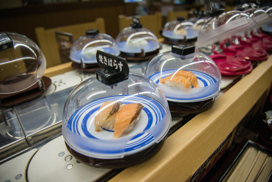 Fresh sushi ready to serve in conveyor belts restaurant