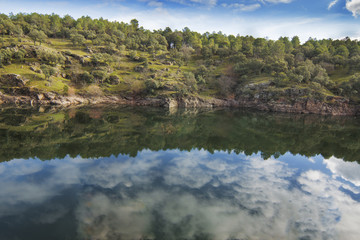 Fototapeta na wymiar Beautiful river landscape and reflections, Spain, Madrid, Buitrago de Lozoya.