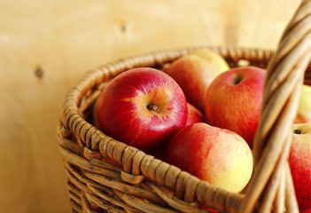 Ripe bright apples in a basket
