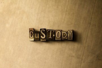 CUSTODY - close-up of grungy vintage typeset word on metal backdrop. Royalty free stock - 3D rendered stock image.  Can be used for online banner ads and direct mail.