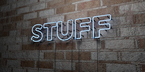 STUFF - Glowing Neon Sign on stonework wall - 3D rendered royalty free stock illustration.  Can be used for online banner ads and direct mailers..