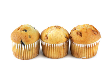 fresh muffins isolated on white background