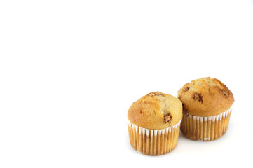 fresh muffins isolated on white background