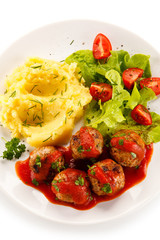 Broiled meatballs, puree and vegetables