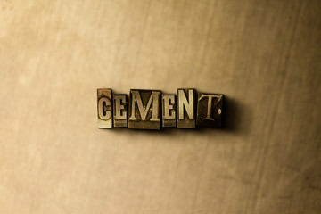 CEMENT - close-up of grungy vintage typeset word on metal backdrop. Royalty free stock - 3D rendered stock image.  Can be used for online banner ads and direct mail.