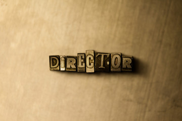 Obraz premium DIRECTOR - close-up of grungy vintage typeset word on metal backdrop. Royalty free stock - 3D rendered stock image. Can be used for online banner ads and direct mail.