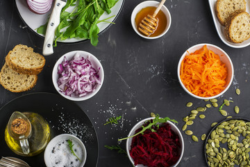 Healthy vegetarian ingredients Carrots, beets, red onion, arugula for fresh salad salads
