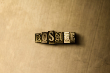 DOSAGE - close-up of grungy vintage typeset word on metal backdrop. Royalty free stock - 3D rendered stock image.  Can be used for online banner ads and direct mail.