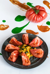 Red tomatoes on white background