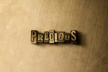 PRECIOUS - close-up of grungy vintage typeset word on metal backdrop. Royalty free stock - 3D rendered stock image.  Can be used for online banner ads and direct mail.