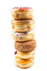 A stack of delicious donuts isolated on a white background