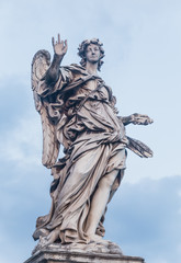 Sculpture of an angel on the bridge of Sant'Angelo in Rome, Ital