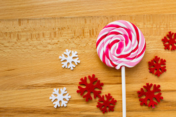 Christmas background lollipop and snowflakes.